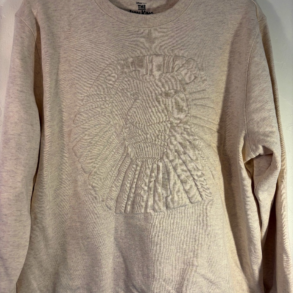 NWOT, L oatmeal colored, embossed, Lion King official musical sweatshirt
